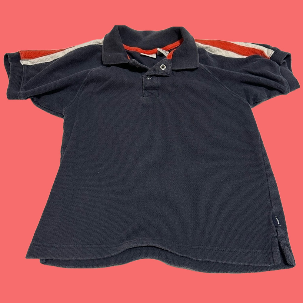 Boys snap front polo in blue with orange & white. Great condition! Size (5/6)